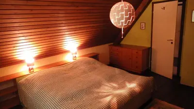 Ein Bett oder Betten in einem Zimmer der Unterkunft Ferienhaus Frieda