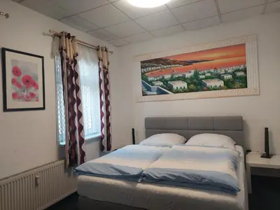 Ein Bett oder Betten in einem Zimmer der Unterkunft Hotel Restaurant Rhodos