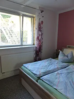 Ein Bett oder Betten in einem Zimmer der Unterkunft Ferienwohnung Seidel