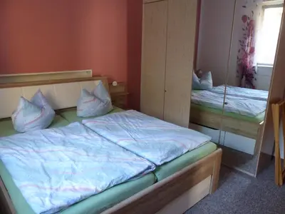 Ein Bett oder Betten in einem Zimmer der Unterkunft Ferienwohnung Seidel