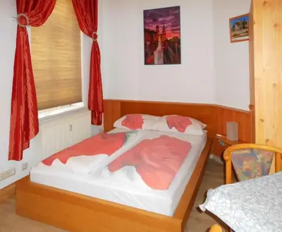 Ein Bett oder Betten in einem Zimmer der Unterkunft Pension Pieschen Dresden