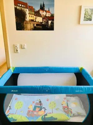 Ein Bett oder Betten in einem Zimmer der Unterkunft Schweizerhaus