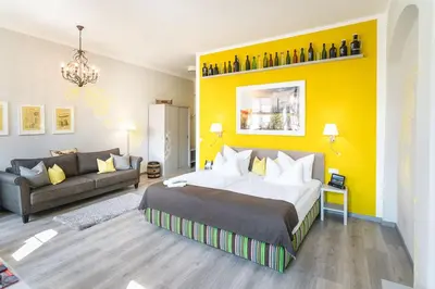 Ein Bett oder Betten in einem Zimmer der Unterkunft Pirnscher Hof - Hotel Garni