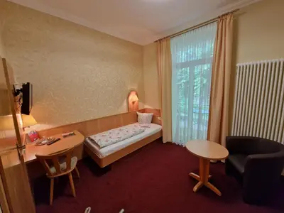 Ein Bett oder Betten in einem Zimmer der Unterkunft Pension Villa Anna