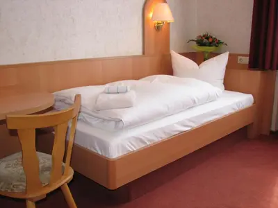 Ein Bett oder Betten in einem Zimmer der Unterkunft Pension Villa Anna