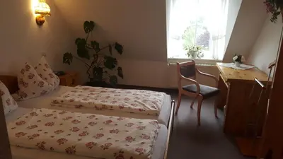 Ein Bett oder Betten in einem Zimmer der Unterkunft Jägerheim Löbsal
