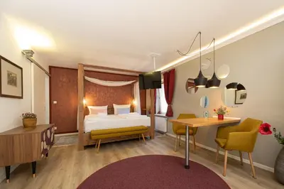 Ein Bett oder Betten in einem Zimmer der Unterkunft Little Suite Apartments