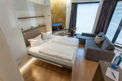 Ein Bett oder Betten in einem Zimmer der Unterkunft Residenz am Zwinger
