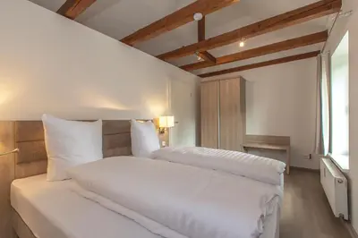 Ein Bett oder Betten in einem Zimmer der Unterkunft Ferienapartments Pirna