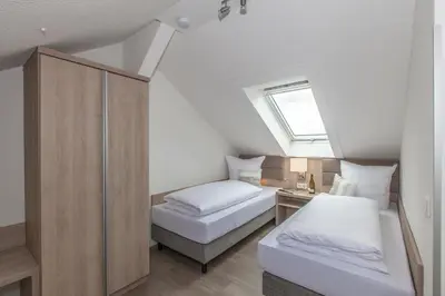 Ein Bett oder Betten in einem Zimmer der Unterkunft Ferienapartments Pirna