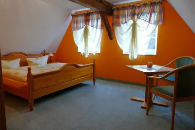 Ein Bett oder Betten in einem Zimmer der Unterkunft No.5 - Ferienwohnung Schkade