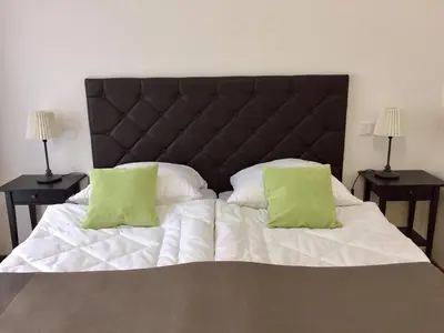 Ein Bett oder Betten in einem Zimmer der Unterkunft Apartment am Zwingerteich