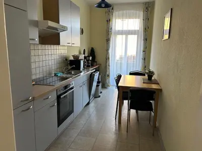 Küche/Küchenzeile in der Unterkunft Ambiente an der Elbe, Wohnung EG
