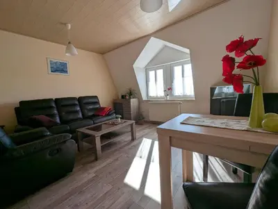 Ein Sitzbereich in der Unterkunft Ambiente an der Elbe, Wohnung OG