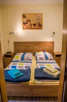 Ein Bett oder Betten in einem Zimmer der Unterkunft Ferienwohnung Franziska Wünsche, Wohnung 1