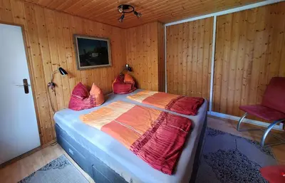Ein Bett oder Betten in einem Zimmer der Unterkunft Ferienhaus Maxen