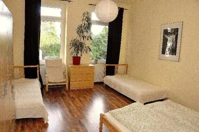 Ein Bett oder Betten in einem Zimmer der Unterkunft Neustadt -Fewo zentral & günstig L6