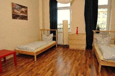 Ein Bett oder Betten in einem Zimmer der Unterkunft 3 Raum Fewo Dresden Zentrum - Balkon Blick auf Altstadt - L10