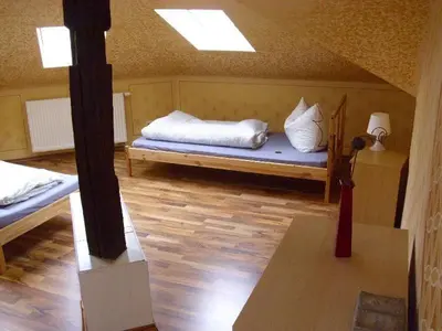 Ein Bett oder Betten in einem Zimmer der Unterkunft 4R Fewo Altstadtblick -L15