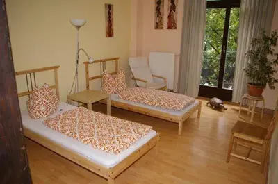 Ein Bett oder Betten in einem Zimmer der Unterkunft 3R Fewo bis 8 Personen zentral T8