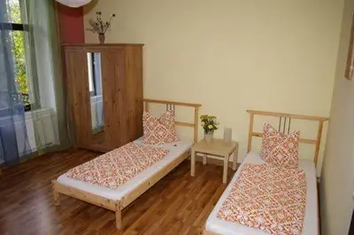 Ein Bett oder Betten in einem Zimmer der Unterkunft 3R Fewo bis 8 Personen zentral T8