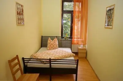 Ein Bett oder Betten in einem Zimmer der Unterkunft 3R Fewo bis 8 Personen zentral T8