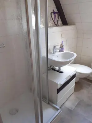Ein Badezimmer in der Unterkunft Ferienwohnung Ritscher in Lichtenhain 2