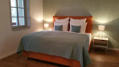 Ein Bett oder Betten in einem Zimmer der Unterkunft Rittergut Rottewitz