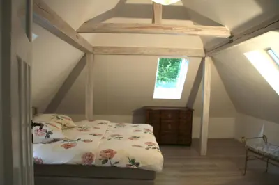 Ein Bett oder Betten in einem Zimmer der Unterkunft Villa Sonnenburg Gästehaus - Blick auf die Stadt und die Elbe - Parkplatz