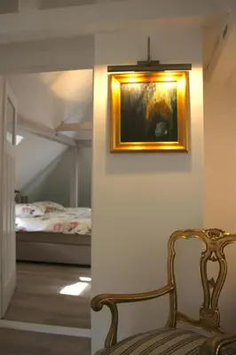 Ein Bett oder Betten in einem Zimmer der Unterkunft Villa Sonnenburg Gästehaus - Blick auf die Stadt und die Elbe - Parkplatz
