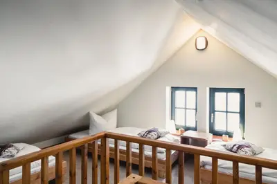 Ein Bett oder Betten in einem Zimmer der Unterkunft Altsächsischer Gasthof Kleines Vorwerk