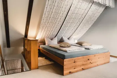 Ein Bett oder Betten in einem Zimmer der Unterkunft Altsächsischer Gasthof Kleines Vorwerk