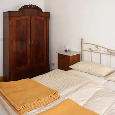 Ein Bett oder Betten in einem Zimmer der Unterkunft Domblick an der Freiheit