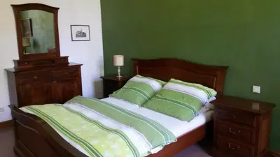 Ein Bett oder Betten in einem Zimmer der Unterkunft Herrenhaus Schmölen GbR