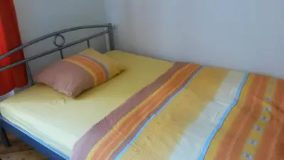 Ein Bett oder Betten in einem Zimmer der Unterkunft Herrenhaus Schmölen GbR