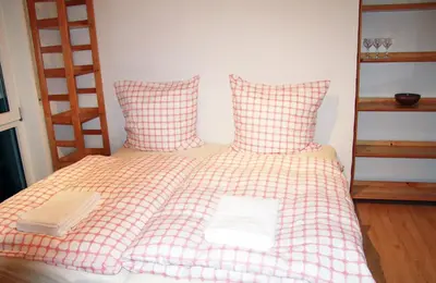 Ein Bett oder Betten in einem Zimmer der Unterkunft Holiday Apartment Zwinger