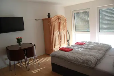 Ein Bett oder Betten in einem Zimmer der Unterkunft Holiday Apartment Zwinger