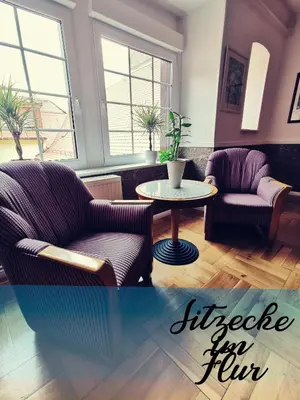 Ein Sitzbereich in der Unterkunft Hotel Goldener Anker