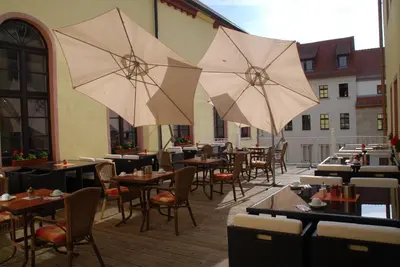 Ein Restaurant oder anderes Speiselokal in der Unterkunft Hotel Goldener Anker
