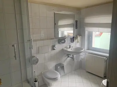 Ein Badezimmer in der Unterkunft Hotel Schwarzes Ross Siebenlehn