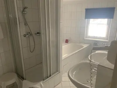 Ein Badezimmer in der Unterkunft Hotel Schwarzes Ross Siebenlehn