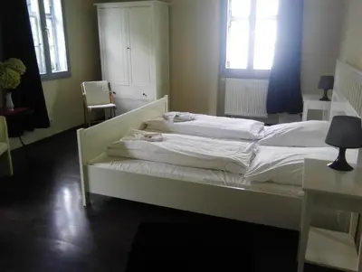 Ein Bett oder Betten in einem Zimmer der Unterkunft Alte Apotheke