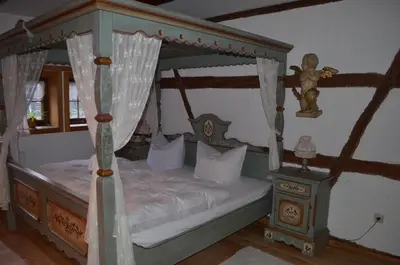 Ein Bett oder Betten in einem Zimmer der Unterkunft zum Frongut