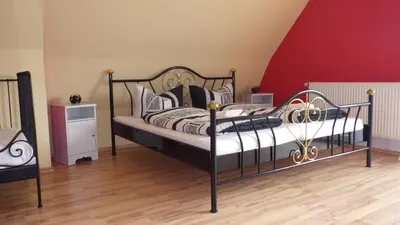 Ein Bett oder Betten in einem Zimmer der Unterkunft Ferienwohnung Am Hegebusch