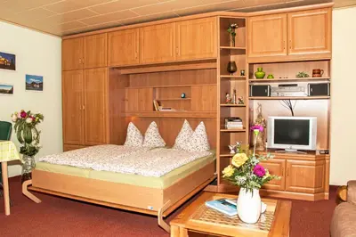 Ein Bett oder Betten in einem Zimmer der Unterkunft Ferienwohnung Henker
