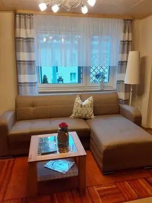 Ein Sitzbereich in der Unterkunft Ferienwohnung Henker