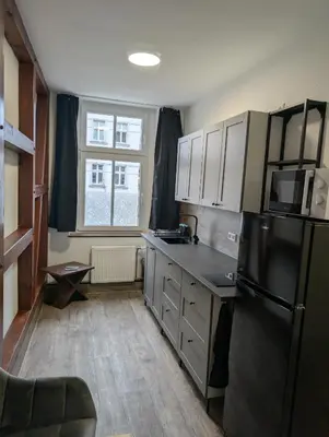 Küche/Küchenzeile in der Unterkunft Richter Apartments Finsterwalde mit Klimaanlage