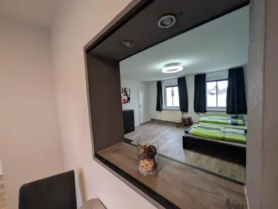 TV/Unterhaltungsangebot in der Unterkunft Richter Apartments Finsterwalde mit Klimaanlage