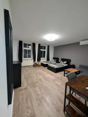 TV/Unterhaltungsangebot in der Unterkunft Richter Apartments Finsterwalde mit Klimaanlage
