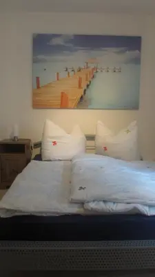 Ein Bett oder Betten in einem Zimmer der Unterkunft FeWo Strohbach